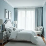 Bedroom with silver accents and light blue walls