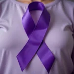 Purple ribbon symbolizing domestic violence awareness.