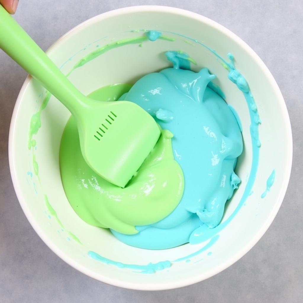 creating mint green frosting using food coloring