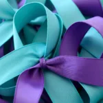 Teal and purple ribbons symbolizing suicide awareness.