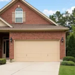 Traditional home with a warm beige garage door