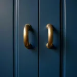 Brass Fixtures Against a Deep Blue Wall