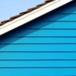 Striking Blue House with Brown Roof and White Trim