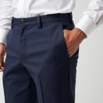 Man in Navy Blue Pants and a White Shirt