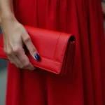 Navy blue nails with a red dress