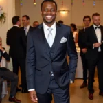 Man in a Navy Suit at a Wedding