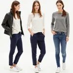 Women's white sneakers with navy pants