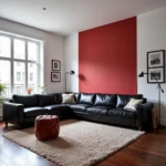 Modern living room with black and red accents.