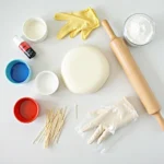 Essential tools and ingredients for coloring marzipan