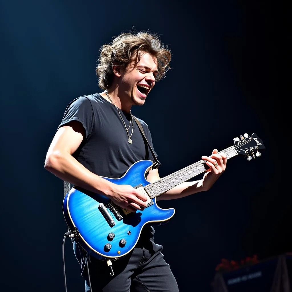 Harry Styles performing with a blue guitar