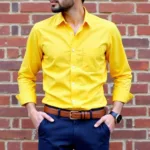 Man in Yellow Shirt and Navy Pants