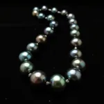 Black Tahitian pearl necklace showcasing the iridescent colors