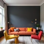 Charcoal gray accent wall in a modern living room with colorful accents