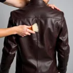 Cleaning a Colored Leather Jacket with a Brush