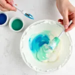 Mixing Blue and Green Gel Food Coloring to Make Teal Frosting