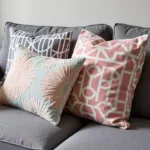 Gray couch with patterned pillows