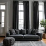 Monochromatic Living Room with Gray Sofa and Curtains