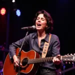 Joan Baez performing De Colores on stage